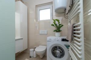 Kúpeľňa v ubytovaní Apartman Tragos
