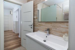 Kúpeľňa v ubytovaní Apartman Tragos