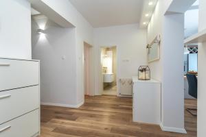Kuchyňa alebo kuchynka v ubytovaní Apartman Tragos