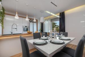 Kuchyňa alebo kuchynka v ubytovaní Apartman Tragos