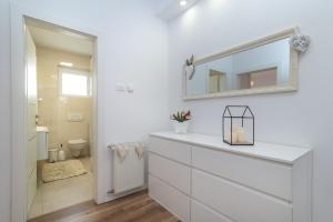 Kúpeľňa v ubytovaní Apartman Tragos + 37 fotografií