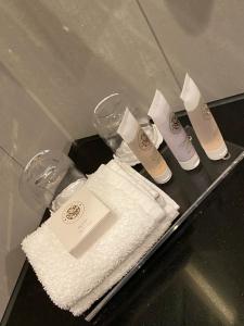 a counter with three pairs of products and towels at Crowne Plaza Aberdeen Airport, an IHG Hotel in Dyce