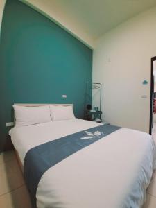 Letto o letti in una camera di 3Kiss Homestay