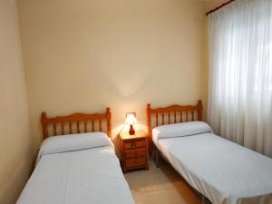 Postel nebo postele na pokoji v ubytování Moli de Vent Superior Orangecosta + 9 fotografií