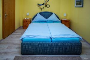 Ένα ή περισσότερα κρεβάτια σε δωμάτιο στο Hotel Restaurant Wolfsschlucht GmbH