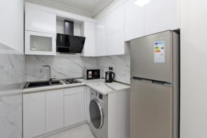 Kuchyň nebo kuchyňský kout v ubytování Appartment Lux, 2 bedroom