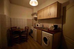 Η κουζίνα ή μικρή κουζίνα στο HBR Friendly Apartment