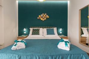
Cama o camas de una habitación en Napolilive B&B
