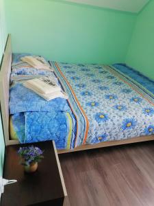 Rúm í herbergi á Vila NATAŠA