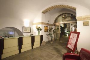 The lobby or reception area at Al Pescatore Hotel & Restaurant