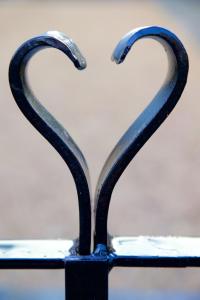 a pair of metal handles in the shape of a heart at Seventeen The Town House Bath in Bath