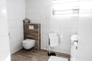 Koupelna v ubytování Villa Forellenweg + 20 fotografií