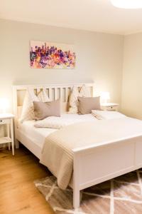 A bed or beds in a room at Villa Forellenweg