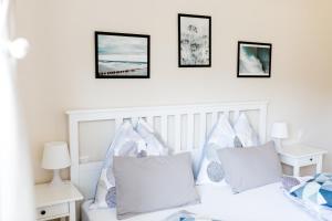 A bed or beds in a room at Villa Forellenweg