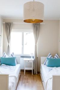 A bed or beds in a room at Villa Forellenweg