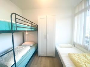 Ένα ή περισσότερα κρεβάτια σε δωμάτιο στο Appartement Westkapelle dichtbij strand WE02 +18 φωτογραφίες