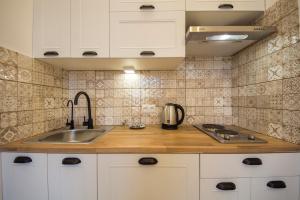 Dapur atau dapur kecil di Idea Design Apart-Hotel Chykalenka