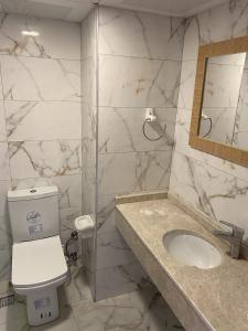 Koupelna v ubytování Tuntas Family Suites Kusadasi