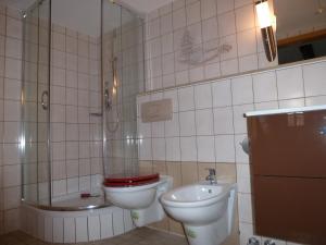 Ванная комната в Pfälzer Landhotel Heinrich