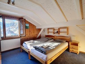 Postel nebo postele na pokoji v ubytování Apartment with beautiful views in Zermatt