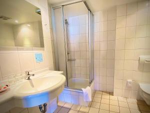 Koupelna v ubytování Meister BÄR HOTEL Wettiner Hof