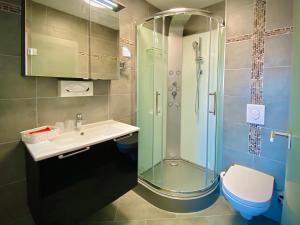 Koupelna v ubytování Meister BÄR HOTEL Wettiner Hof