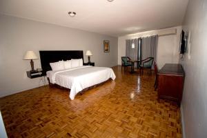 TV a/nebo společenská místnost v ubytování Hotel Posada Tierra Blanca
