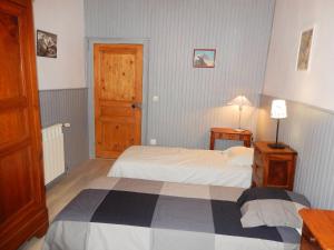 Ένα ή περισσότερα κρεβάτια σε δωμάτιο στο Appartement de 2 chambres avec balcon et wifi a La Grave