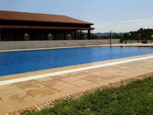 Bazén v ubytování Buhardilla rústica muy acogedora nebo v jeho okolí