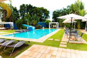 Het zwembad bij of vlak bij Hotel Casa Amarela