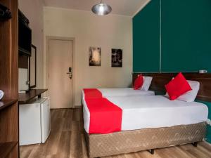 A bed or beds in a room at MOVA 104 - Hotel Consulado Avenida Paulista