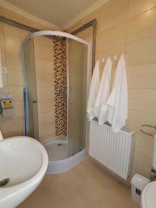 Koupelna v ubytování Gyöngyvirág Apartmanház