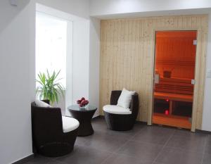 Posezení v ubytování Hotel Vila Viola