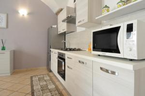 Kuchyňa alebo kuchynka v ubytovaní St. George Apartment