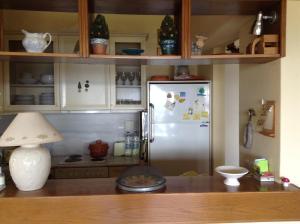 A kitchen or kitchenette at Villa Bouboule