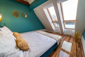 Posteľ alebo postele v izbe v ubytovaní Lawendowe wzgórze Apartamenty