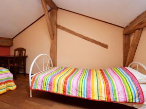 Postel nebo postele na pokoji v ubytování Rustic Farm Stay in Rogery