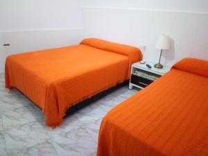 A bed or beds in a room at CASA VASCO