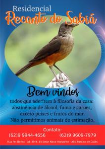 een flyer met een vogel op een rots bij Residencial Recanto do Sabiá in Alto Paraíso de Goiás