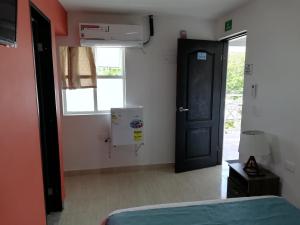 Posada Smith Town客房内的一张或多张床位