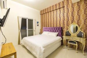 Postel nebo postele na pokoji v ubytování Square B&B