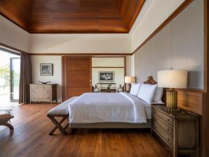 Postel nebo postele na pokoji v ubytování Villa Kailasha by Elite Havens