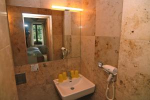 Kúpeľňa v ubytovaní Hotel Klika