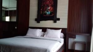 Ein Bett oder Betten in einem Zimmer der Unterkunft Villa Ulin A3 at Villa Ubud Anyer