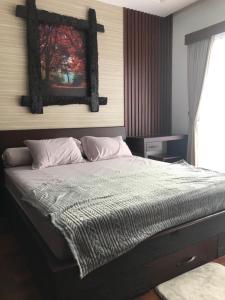 Ein Bett oder Betten in einem Zimmer der Unterkunft Villa Ulin A3 at Villa Ubud Anyer