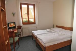Posteľ alebo postele v izbe v ubytovaní Hotel Klika