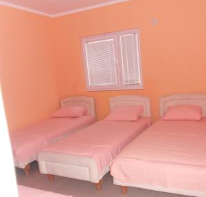 Postel nebo postele na pokoji v ubytování Apartmans Hari