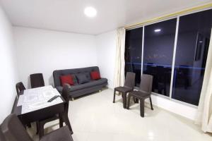 Posezení v ubytování Hermoso y cómodo apartamento