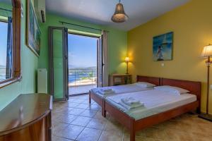 Postel nebo postele na pokoji v ubytování marmar villas + 33 fotografií
