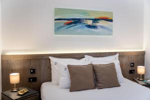 Postel nebo postele na pokoji v ubytování CentRoom Gold + 2 fotografie